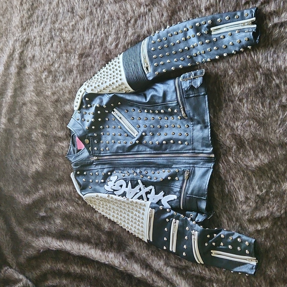 Studded black and white leather jacket